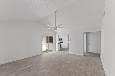 This photo showcases a bright, open living room wi