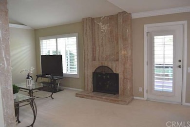 The living room features a marble fireplace, easy 