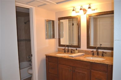Adult Height double vanity with granite counter to