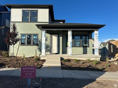 View of exterior entry with a porch