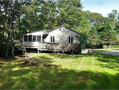 Exterior Front. Large corner lot, a side deck set