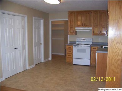 Remodeled kitchen with new flooring and new dishwa