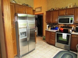 stainless appliance, granite counter tops, vaulted