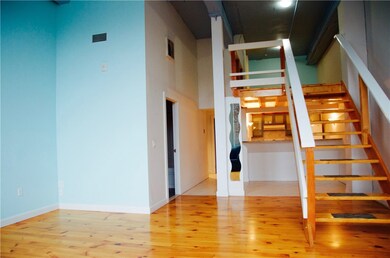 View toward loft and kitchen