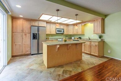 Open floor plan from kitchen to dining room to  li