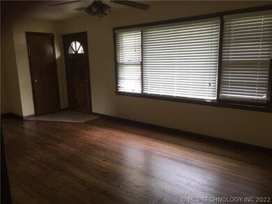 living front door and coat closet