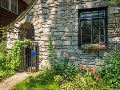 The front of the home with an additional gated ent