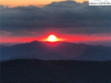 And later drifts slowly behind the Blue Ridge.