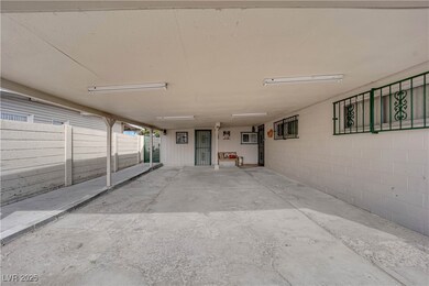 Property entrance featuring fence