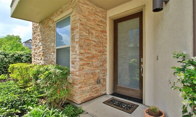 A landscaped pathway leads to
the grandeur glass