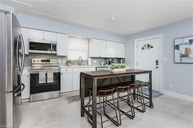 Updated kitchen with quartz counters and new appli
