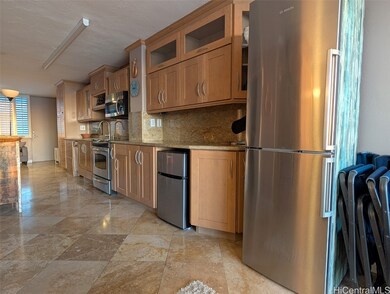 Reverse view of the kitchen. Main fridge is on the
