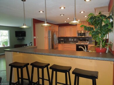 Wonderful breakfast bar with stools perfect for ad