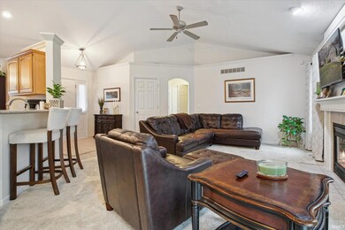 Living room open to dining area and kitchen