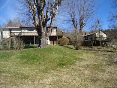 Back view with both homes, large backyard, plenty 