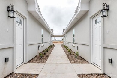 View of property exterior with stucco siding