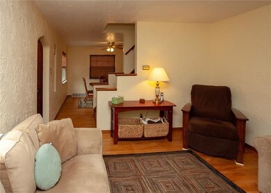 The stunning hardwood floors greet you in the fron