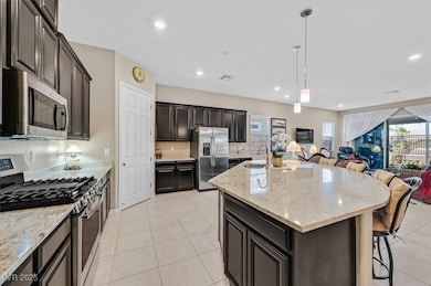 Kitchen featuring stainless steel appliances, open