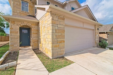 Entrance to property featuring driveway, fence, s