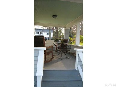 Porch - Open. the side porch runs the entire lengt