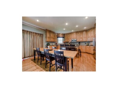 The huge kitchen offers a large eat-in area, spaci