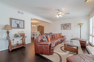 Large family room with wood laminate flooring
