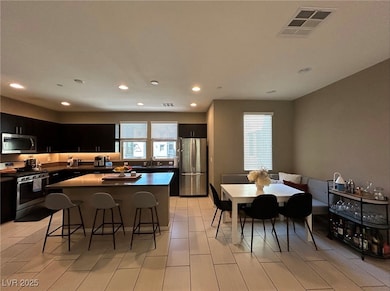 Kitchen featuring stainless steel appliances, a ki
