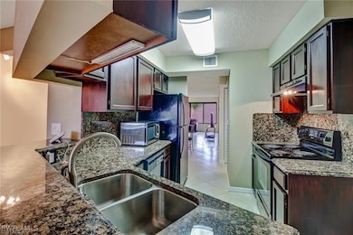 124 Cypress Way E unit E5, Naples, FL 34110 - photo 3