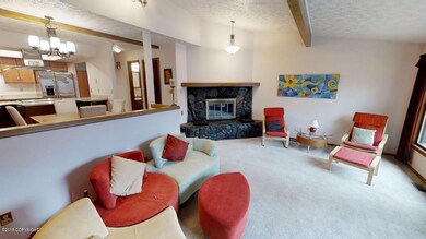 Living Room Opens to Dining and Kitchen