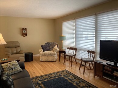 Living room with huge front windows