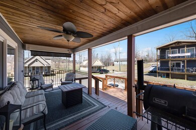 Wooden deck featuring a ceiling fan and area for g