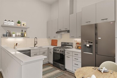 Kitchen with appliances with stainless steel fini