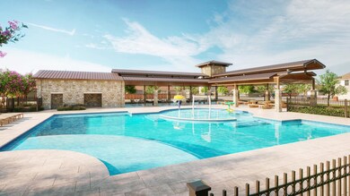 Community pool featuring a patio