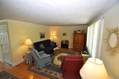 Large Living room with gorgeous hardwood floors.
