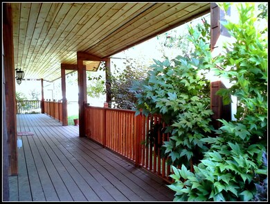 A full frontal, covered porch