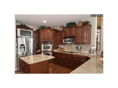 Staggered cabinet heights and convenient double ov