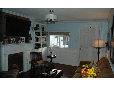 Living Room. Custom built-ins, moldings and mantle