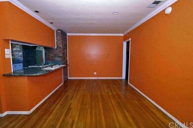 Inviting living room with hardwood floors, recesse
