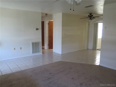 The hallway to the left leads to the bedrooms & ba