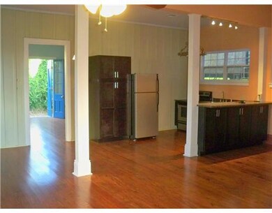 Kitchen. Living area leads to kitchen and Master B