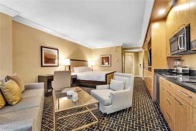 Bedroom with crown molding and dark carpet