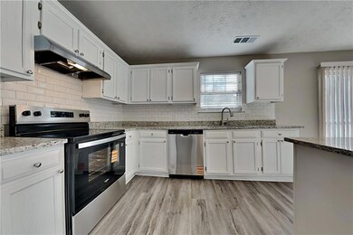 5260 Harbins Point Ln NW, Lilburn, GA 30047 - photo 4