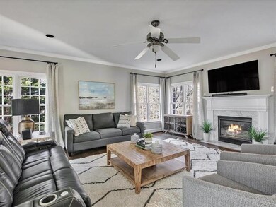Family room with refinished hardwood flooring and 
