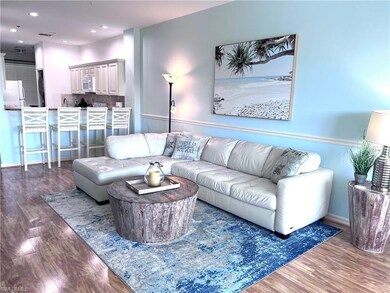 Living room featuring hardwood / wood-style floori