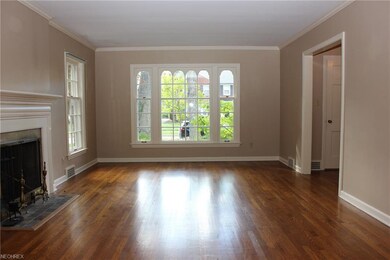 VIEW TOWARDS THE FRONT OF THE HOME. ARCHWAY LEADS 