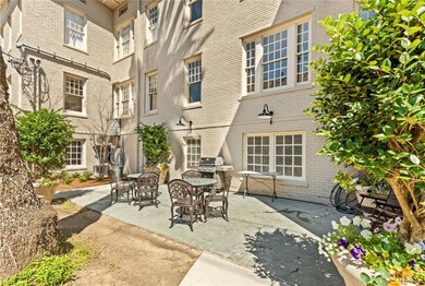 Spacious shared patio with grill and bistro seatin