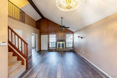 Beautiful paneled wall sets off the woodburning fi