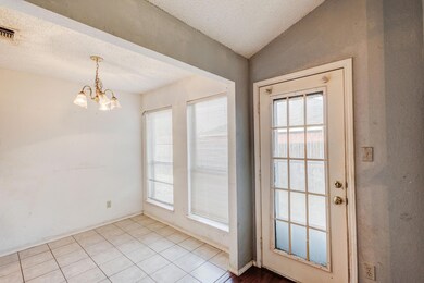 Doorway to outside with lofted ceiling, a wealth o