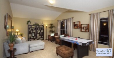 game room  of model: Photo is of this same plan of the model home. Options and upgrades will vary to subject home.
