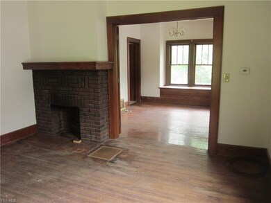 Standing in living room looking into dining room